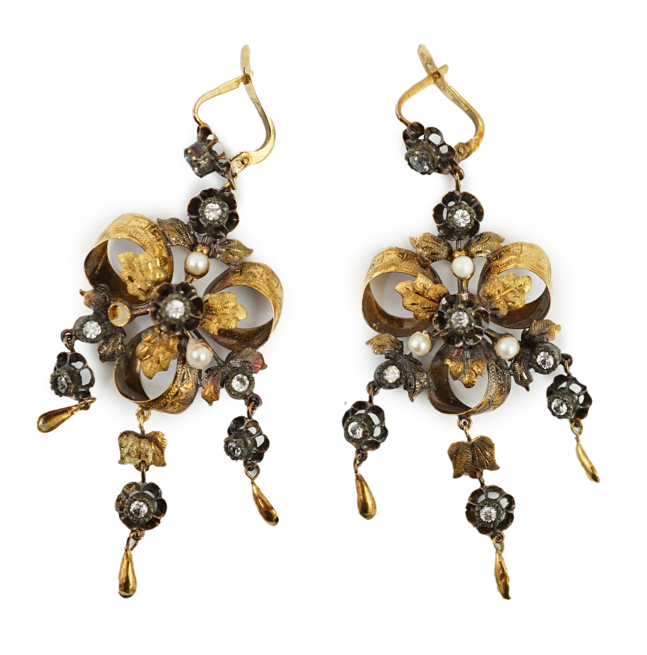 A pair of Victorian gold, seed pearl and simulated diamond set triple drop earrings